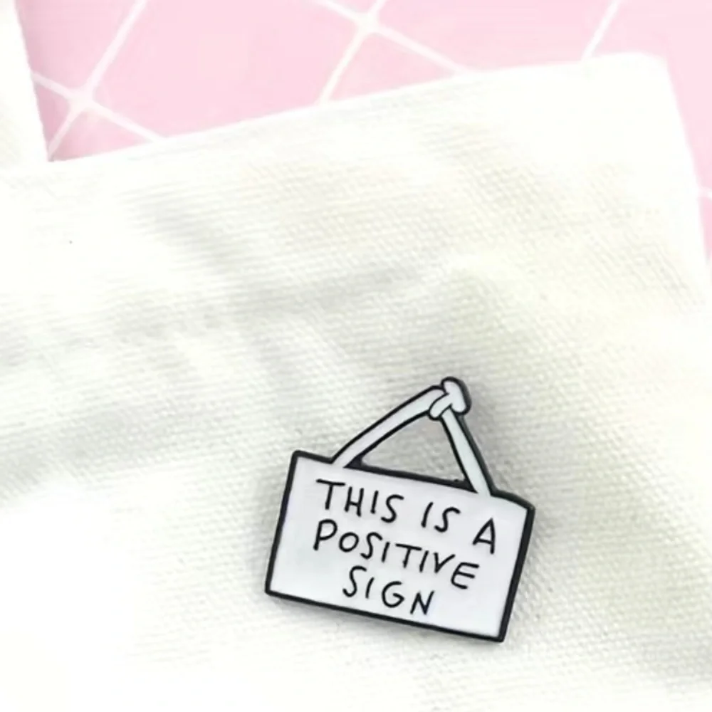 3/$25 Acrylic Pin “This is a Positive Sign” White Sign Pin with Black Le…